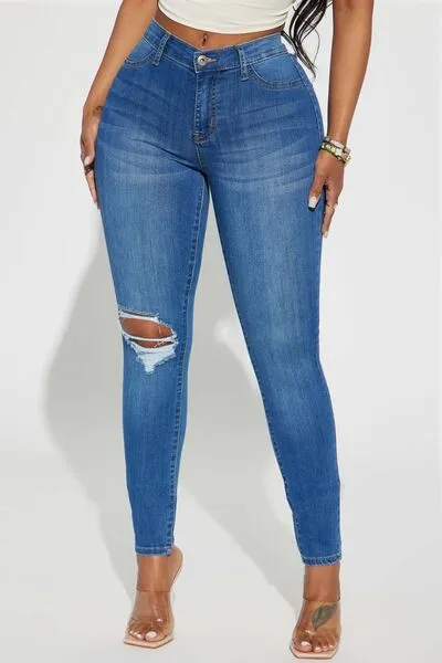 Chic Distressed High-Waisted Denim Jeans with Handy Pockets